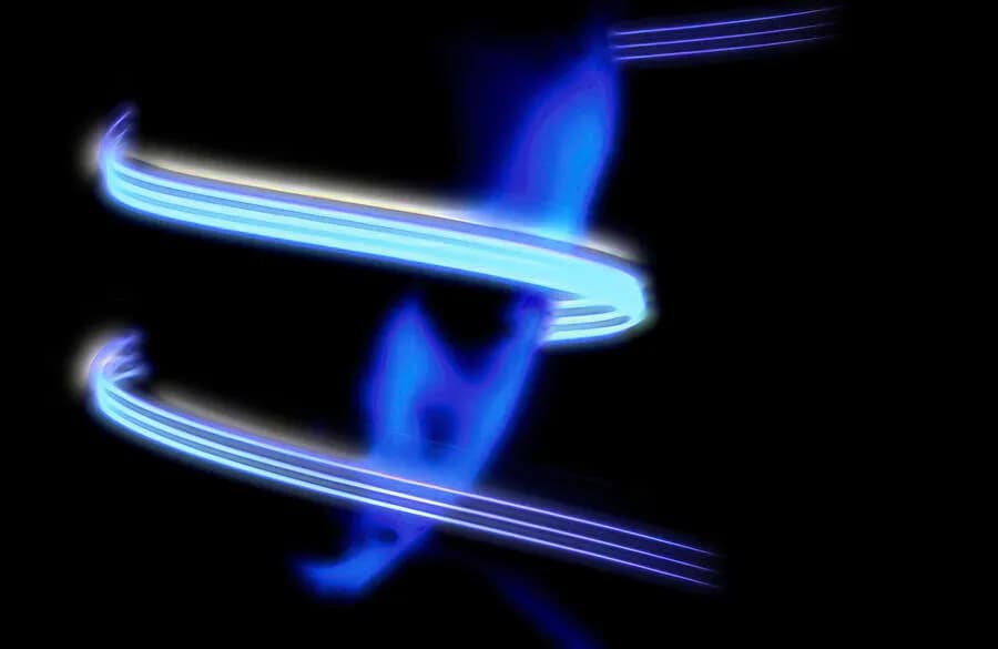 Whirling Light: A Dance of Blue in the Dark