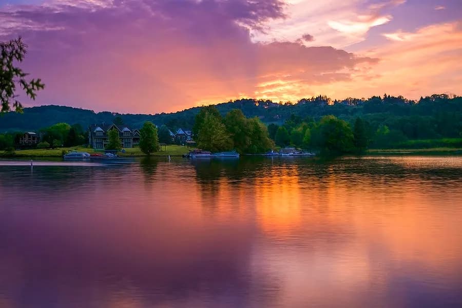 Whispers of Twilight: A Serene Sunset Reflection Over Tranquil Waters