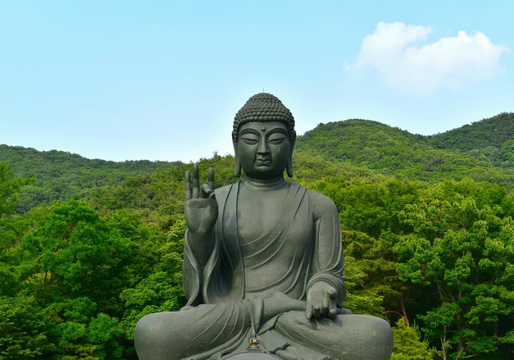Serenity in Stone: The Majestic Buddha Amidst Nature's Embrace