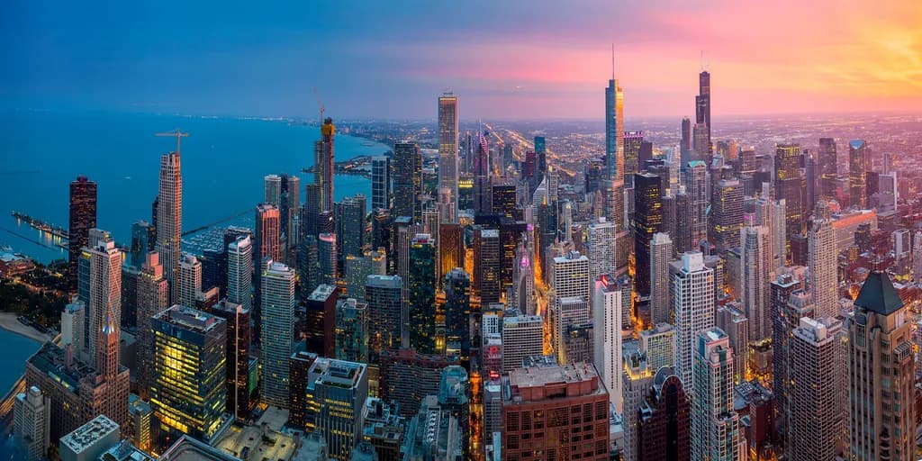Urban Symphony: A Panoramic Dance of Light and Shadow Over the Cityscape at Dusk