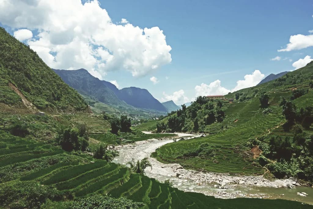 Whispers of the Valley: A Serene Landscape of Rice Terraces and Majestic Mountains