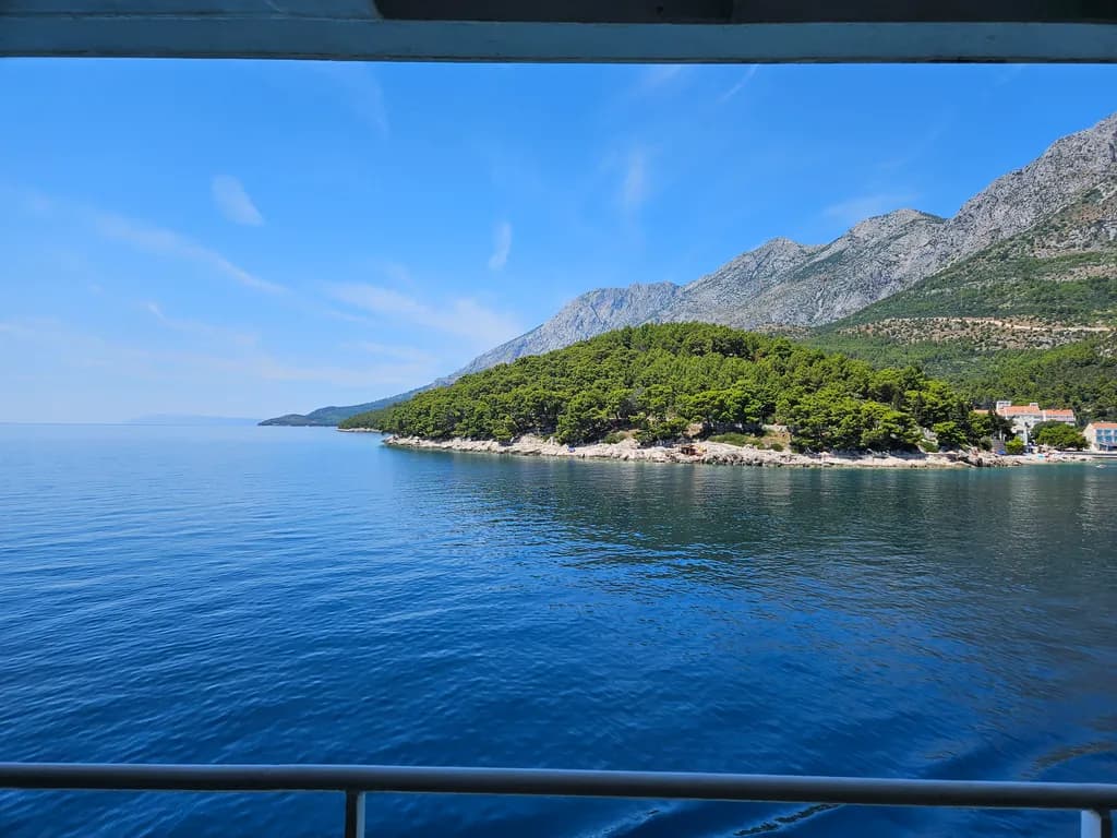 Serenity by the Coastline: A Tranquil Reflection of Water and Sky